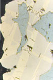 Siegenite and cobalt pentlandite, two rare Co-Ni minerals, in a polished section from Central Wales.