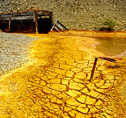 Ochre, precipitated from acid mine drainage, Cwmrheidol lead mine, 1992.