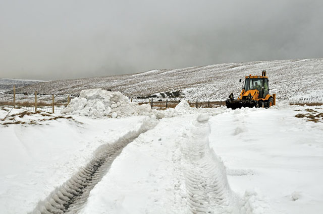 Clearing the snow - Dylife Road summit area