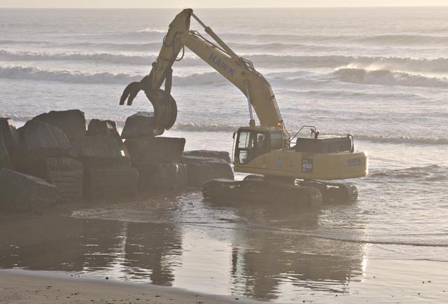 grab moving boulders on Tywyn beach