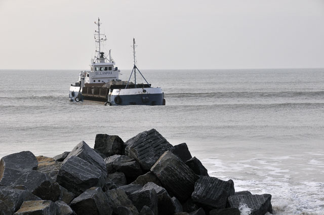 Tywyn Dea Defences: delivery of boulders by sea