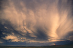 Mammatus and incredible sheared thunderstorm anvil at sunset - Dylife
