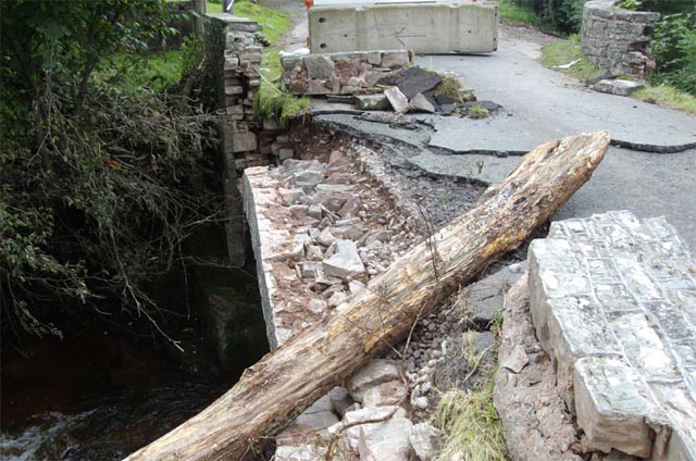 Damaged bridge on Afon Ysgirfawr at Pontfaen
