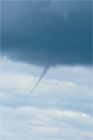 Funnel-cloud descending from a storm over the Welsh mountains, August 2000