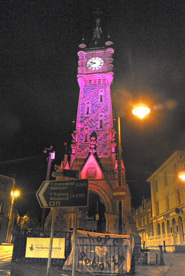 machynlleth clocktower lit up in pink