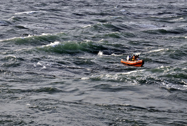 small boat in bardsey sound riptide